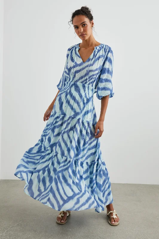 Striped women swimwear with a classic pattern for a timeless beach lookCATERINE DRESS - BLUE WATERCOLOR STRIPES