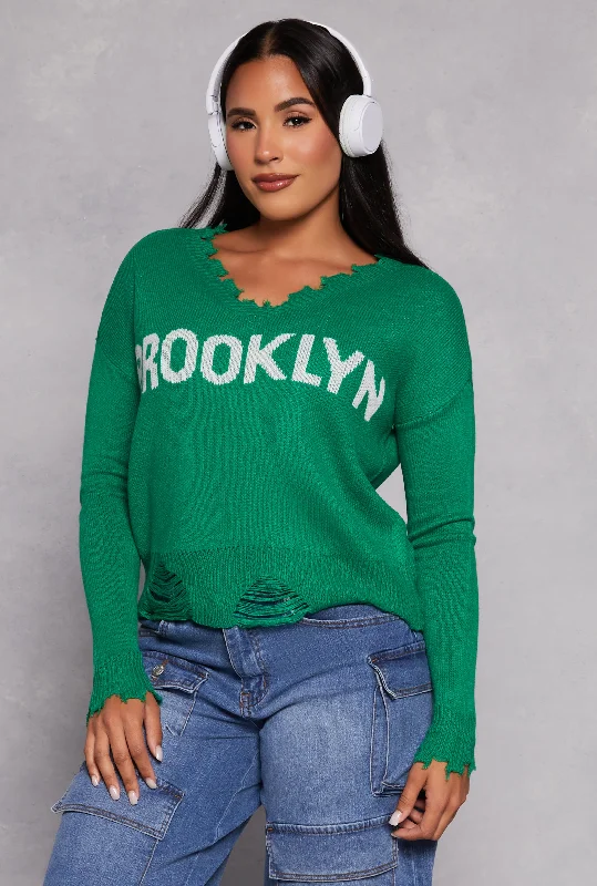 Hand - Knitted Women Sweater with Artisanal CharmBrooklyn Graphic Distressed V Neck Sweater